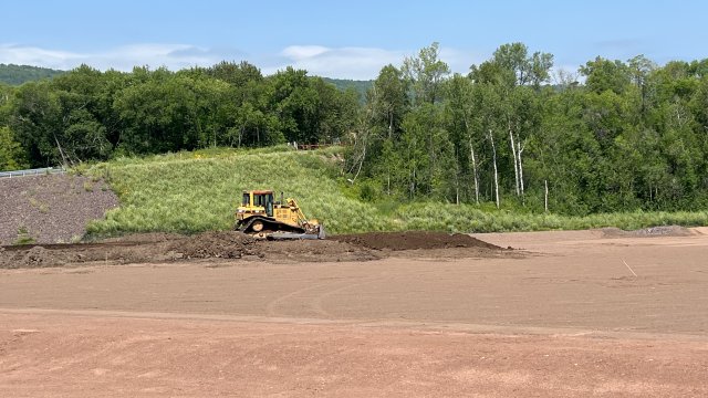 The topsoil layer is placed on the Upland Confined Disposal Facility (CDF).