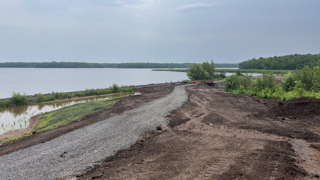 A segment of the pedestrian trail at the Wire Mill Pond area is in construction. 