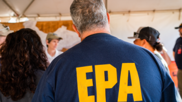 A male employee with a dark blue shirt that reads EPA on the back.
