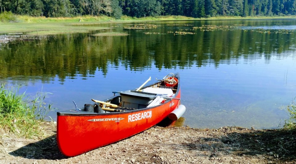 A research canoe ready to sample a lake.