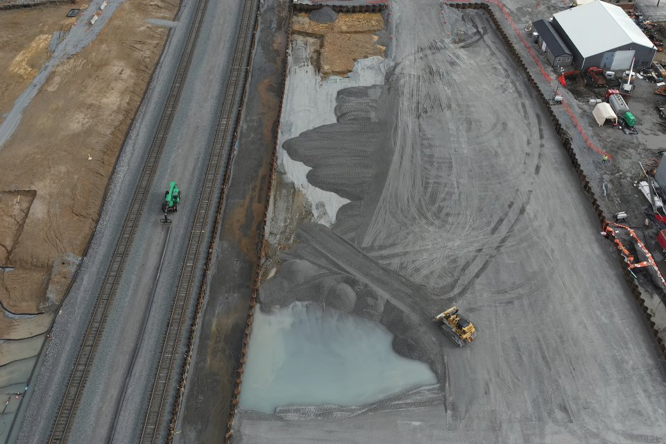 Aerial view of the main area of the train derailment showing land cleaned and backfilled with stone