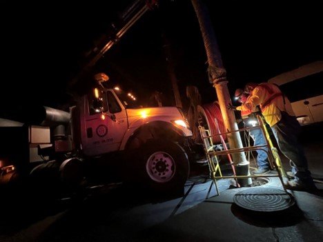Photo 2: Local contractors using a vacuum truck to clear out the sewer lines during EPA nighttime operations in Lahaina.