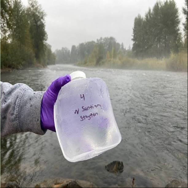 Sample collection in the North Santiam River downstream of the Beachie Creek Fire (photo credit CSS Inc)