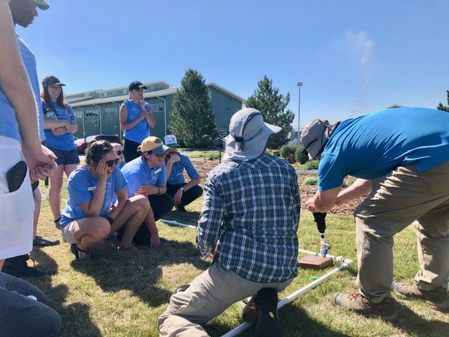 Outdoor class examining irrigation systems