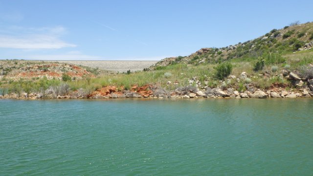 Lake in Texas with hills in background
