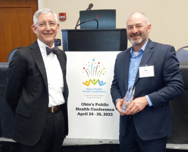 Director, Dr. Bruce Vanderhoff (left) presented the award to Health Commissioner, Dr. Wesley J. Vins (right) from Columbiana County Health Department