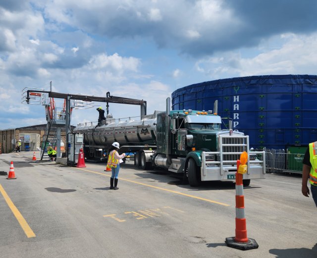Truck being loaded with wastewater for transportation off-site