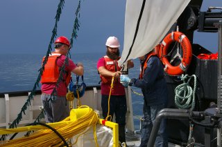Scientists collect a zooplankton sample for contaminant analysis. Photo credit: Mike Milligan, SUNY Fredonia