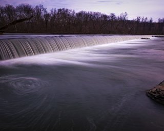 River with water falling over spillway