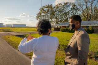 Administrator Regan speaking to a community member