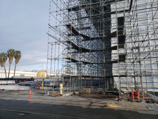 Building exterior covered in scaffolding.