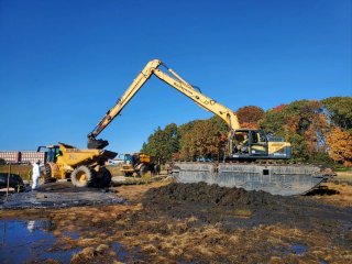 Heavy equipment cleaning up