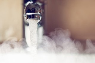 hot water and steam coming from a faucet