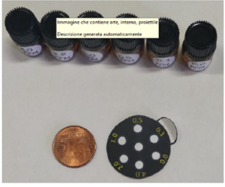 The SCENTINEL paper sensor with 5 vials of calibrators.